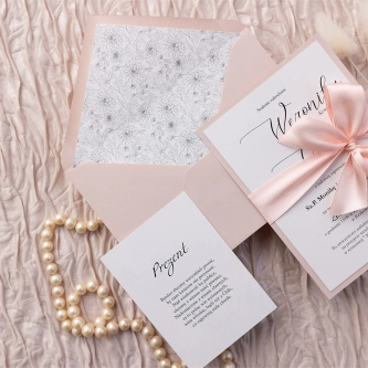 Zaproszenia ślubne Minimalistyczne w&nbsp;pudrowym różu z&nbsp;wkładką i&nbsp;wstążką